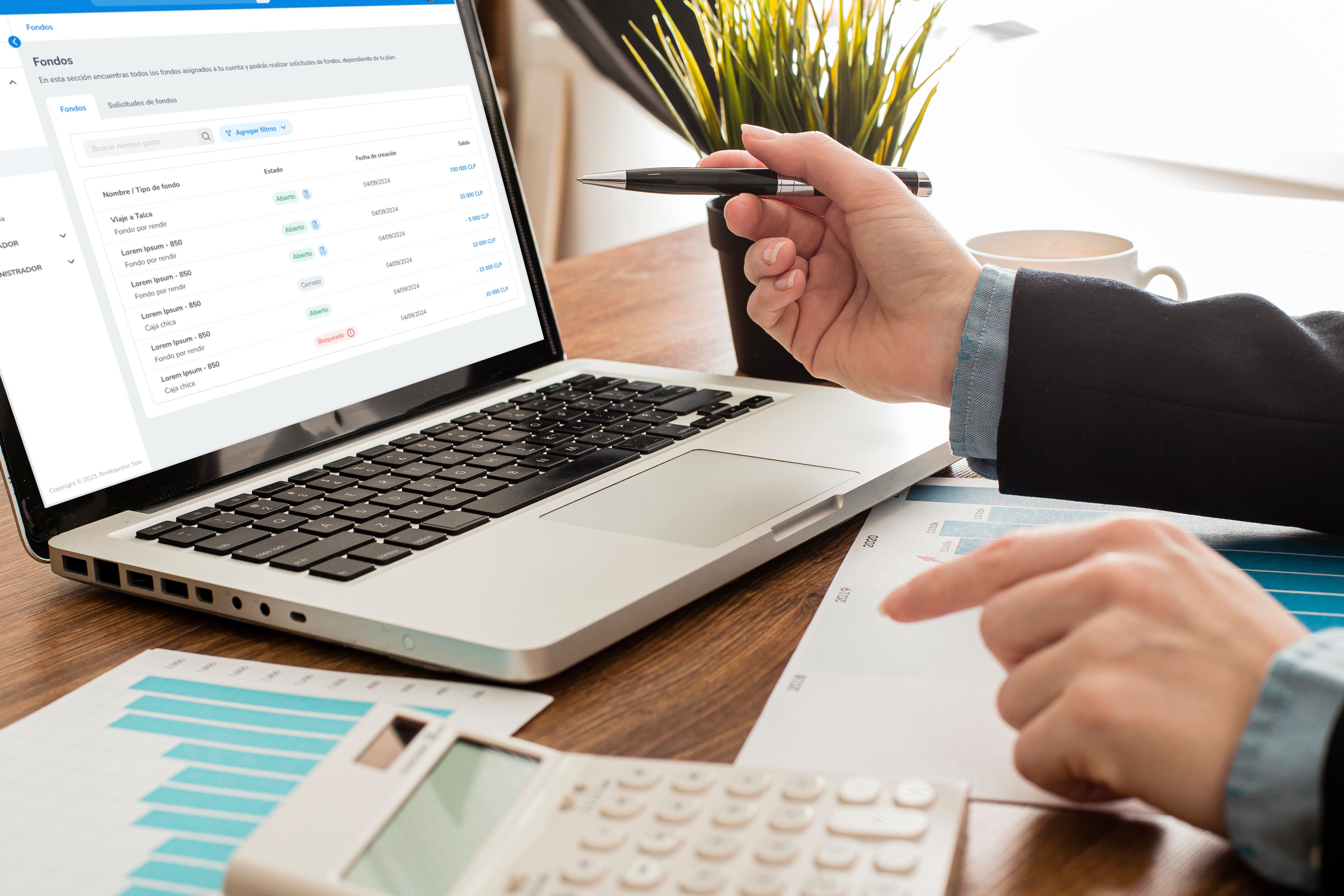 businessman-with-laptop-calculator-office