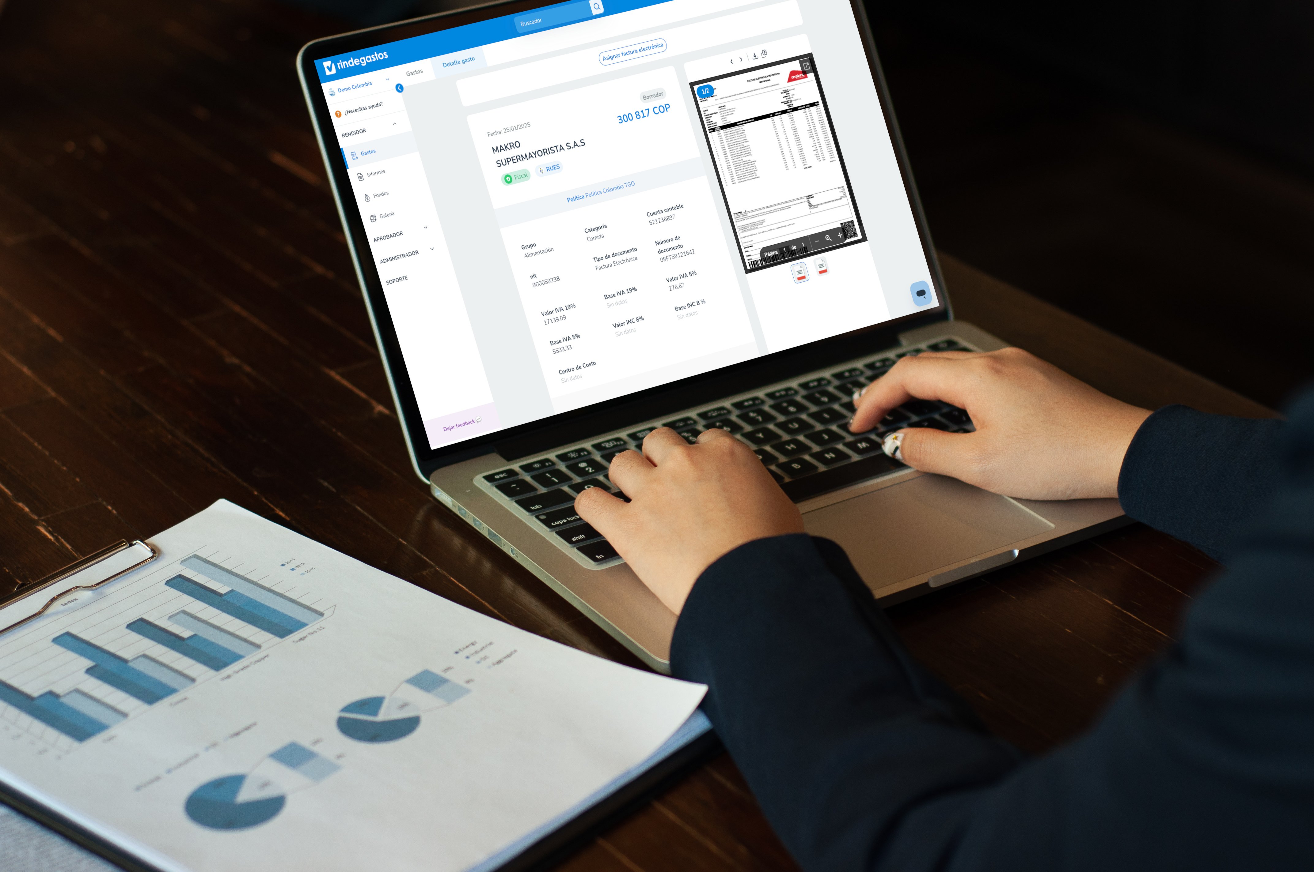 cropped-hands-businesswoman-using-laptop-table-office